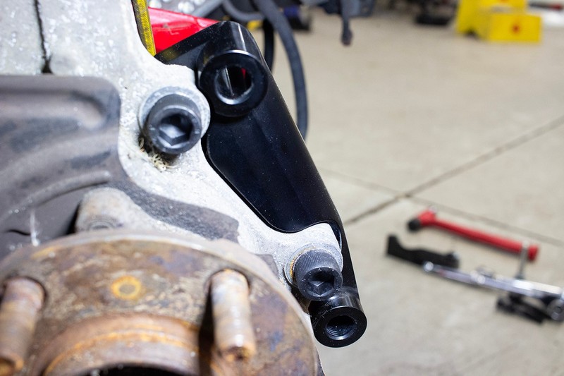 ROFU Front Caliper Adapter fitting 370Z sport Akebono Caliper to Z33 G35 Chassis gallery
