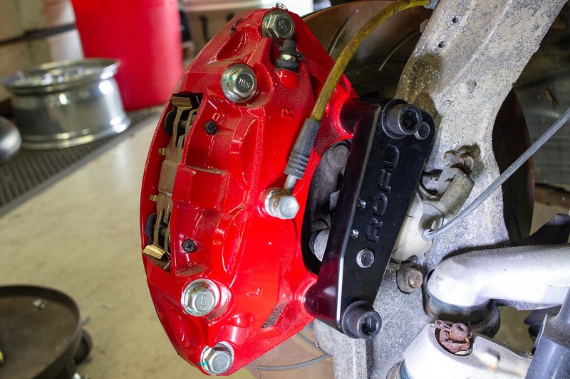 ROFU Front Caliper Adapter fitting 370Z sport Akebono Caliper to Z33 G35 Chassis gallery