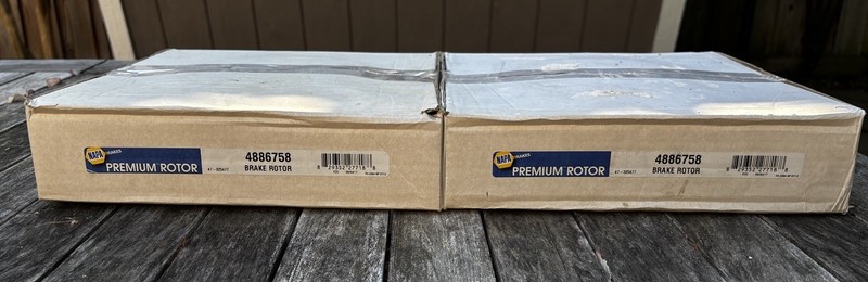 Pair (2) NAPA NEW Premium Brake Rotors #4886754 — Saab Saturn