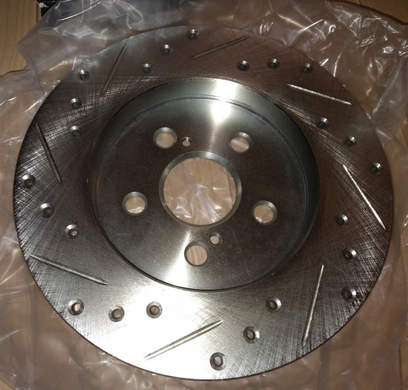Dynamic Friction 631-76083R - Drilled and Slotted Silver Zinc Brake Rotor gallery