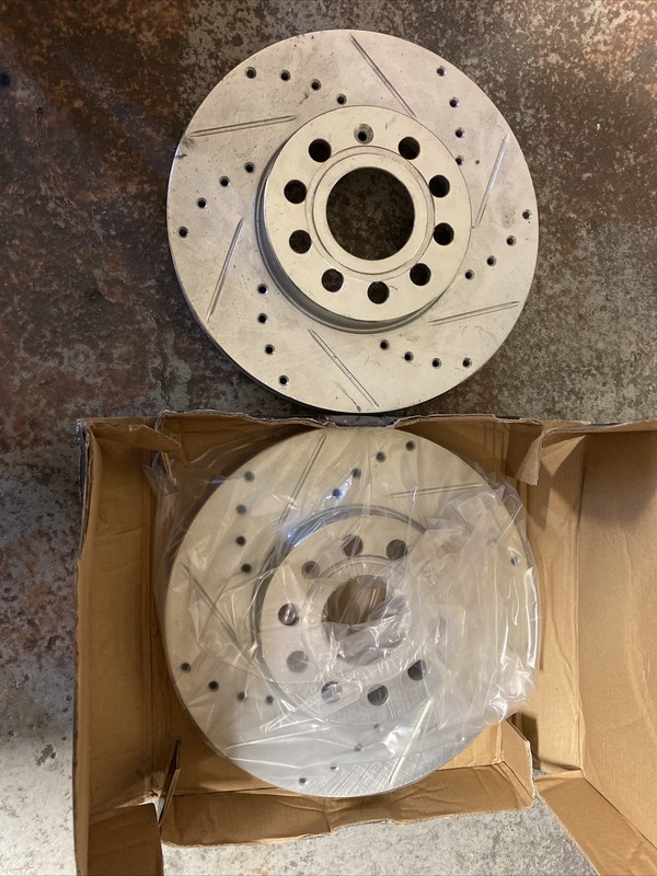 VW AUdi. 631-74028L – Drilled and Slotted Silver Zinc Brake Rotor