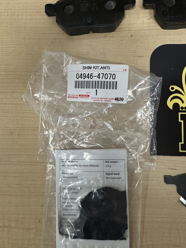2012-2015 TOYOTA PRIUS PLUG-IN REAR BRAKE KIT OEM ROTORS TCMC PAD KIT & SHIM KIT gallery