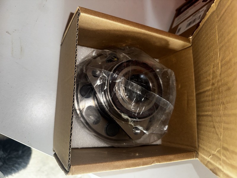 Front Suspension , Grade Rotors, Calipers,Hub,Struts,& CV Axle, brand new!! gallery