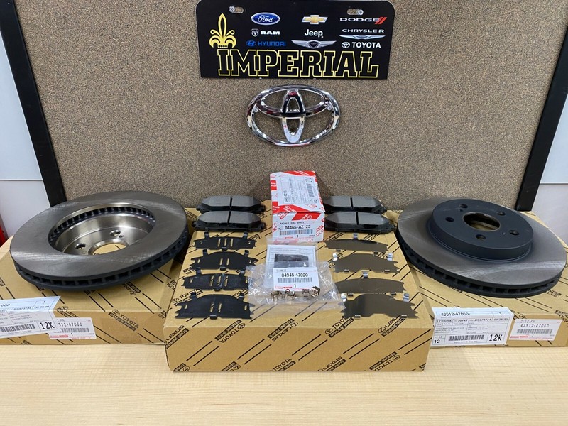 2016-2021 TOYOTA PRIUS GENUINE NEW FRONT BRAKE KIT OEM ROTORS TCMC PADS & SHIMS
