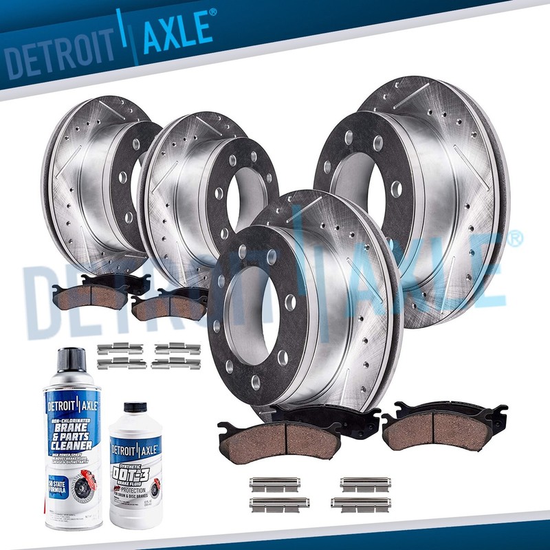 Front Rear DRILLED Rotors + Ceramic Brake Pads for 2001 2002 Dodge Ram 2500 3500