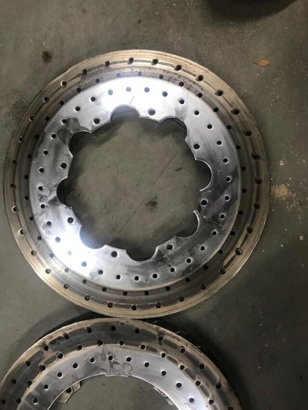Pair 14 inch curved vane drilled rotors. gallery