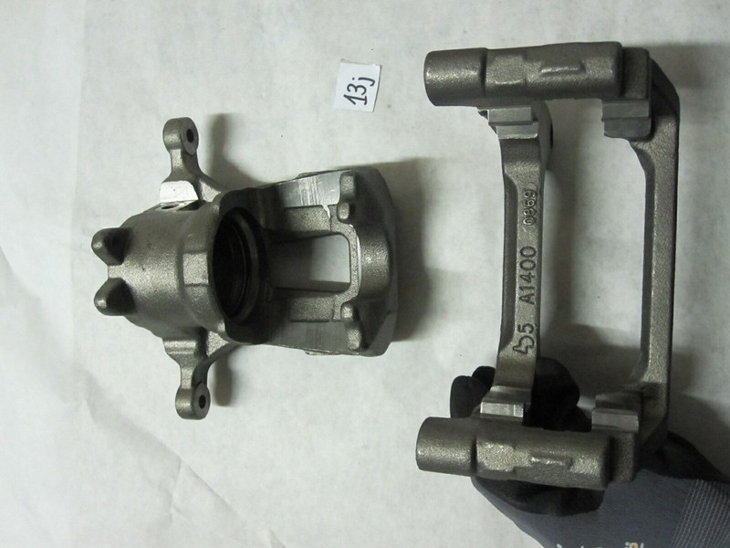ONE New Rear Right BARE Caliper + Bracket 2019-2021 GMC Sierra 1500 Performance gallery