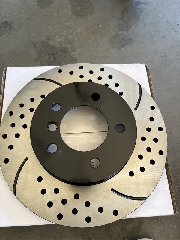 Front Drilled Slotted Disc Brake Rotors with new brake pads and new clips