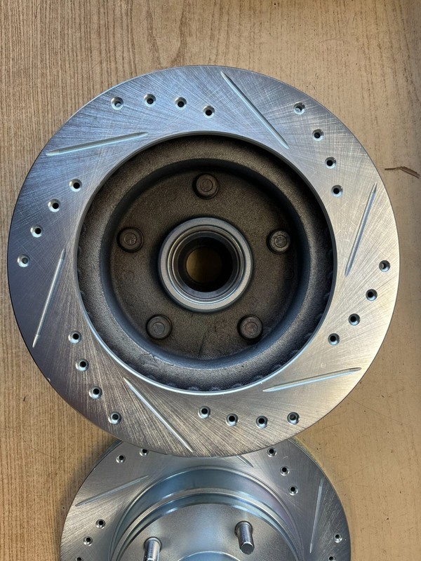 Ford F100 73-83, F150 75-93 RWD Front Drill Slot Rotors Ceramic Brake Pads gallery