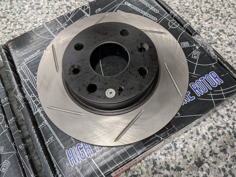 Mazda Miata 1990-1993 1.6 Rear Slotted StopTech Rotors Left Right Pair gallery