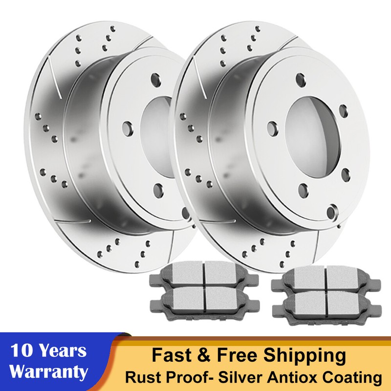 REAR DRILLED Rotors Brake Pads Fit Dodge Caliber Mitsubishi Lancer Jeep Compass