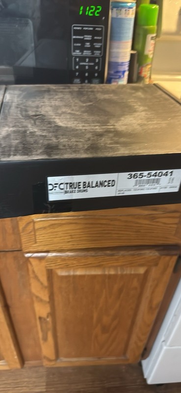 Boxes Full Of Brake Drums And Brake Pads