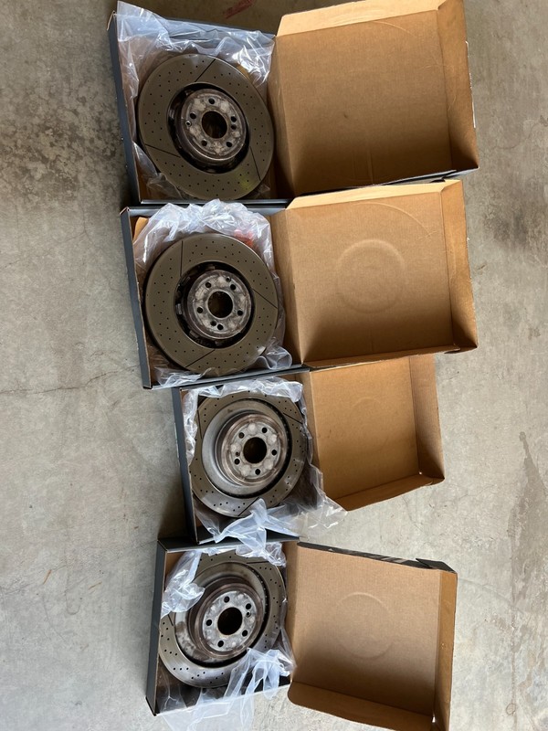 OEM 14-16 MercedesBenz W212 E63S AMG Sedan Rotors Set of 4 and Pads 2124210512