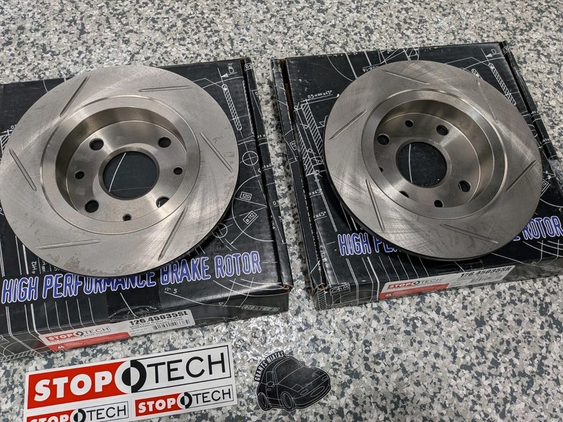 Mazda Miata 1990-1993 1.6 Rear Slotted StopTech Rotors Left Right Pair gallery
