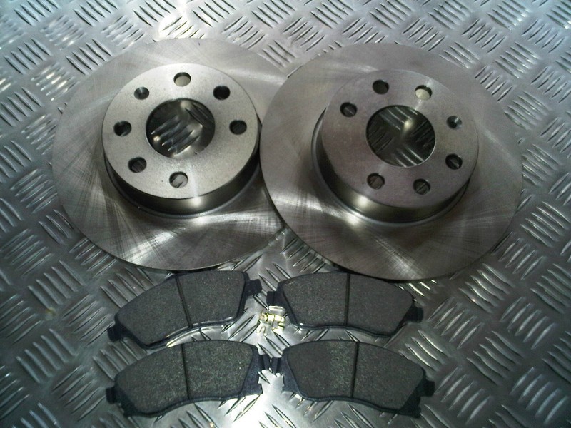 VAUXHALL CORSA C 1.0 1.2 2000-2006 FRONT 2 BRAKE DISCS AND PADS SET NEW (SOLID)