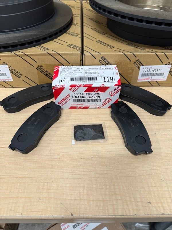 2010-2014 TOYOTA FJ CRUISER GENUINE OEM REAR BRAKE ROTORS TCMC PAD KIT & SHIMS gallery