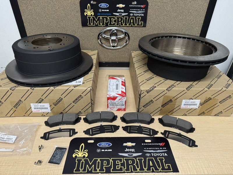 1998-2007 TOYOTA LAND CRUISER REAR BRAKE KIT OEM ROTORS TCMC PADS & SHIMS NEW