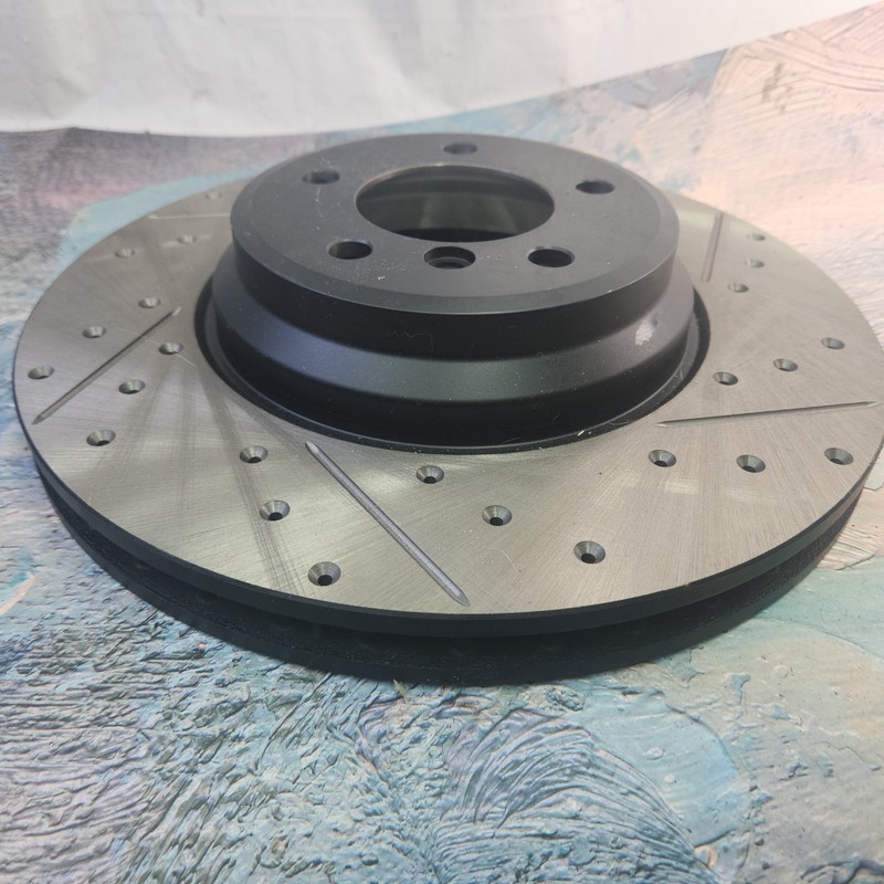 Stop Tech 127.34093L Rotor For 07-13 3 Series 13-15 X1 Front LH Drilled Slotted