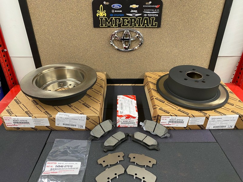2009-2015 TOYOTA VENZA GENUINE OEM NEW REAR BRAKE ROTORS TCMC PAD KIT AND SHIMS