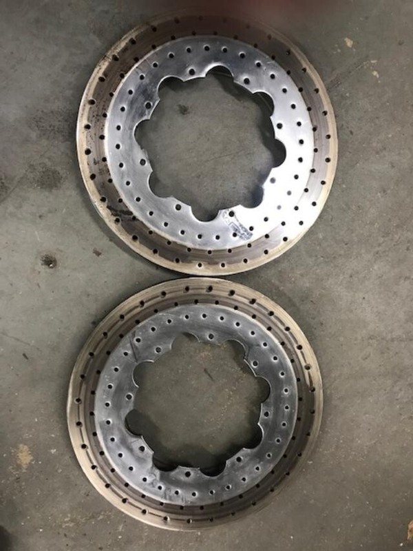 Pair 14 inch curved vane drilled rotors.